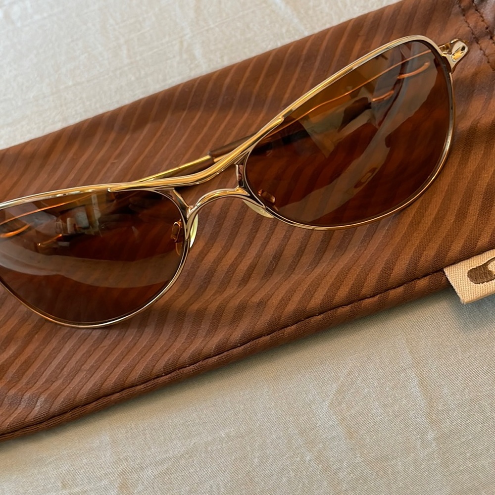Gold Oakley sunglasses